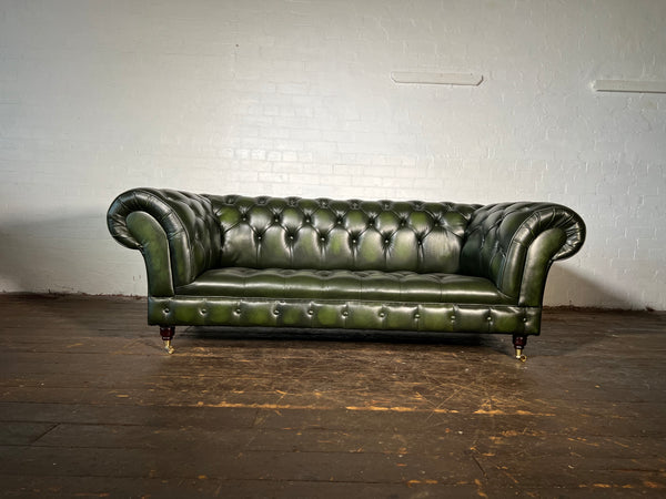 1931 Chesterfield sofa in antique green leather