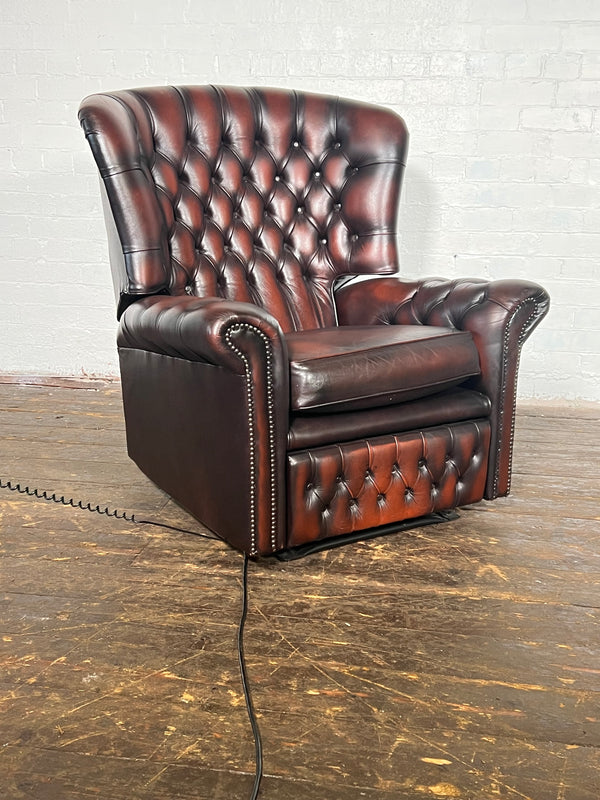 Electric recliner in oxblood leather